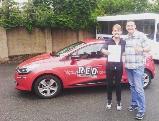 Danny Wilkin with his RED Driving School instructor Dave Bentley and his pass certificate