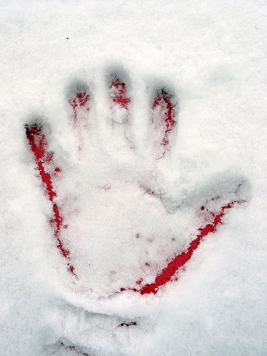 Red handprint in snow