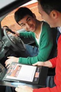 Learner driver in car with instructor