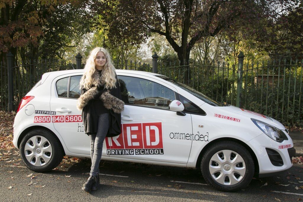 Nina Nesbitt with RED driving school car