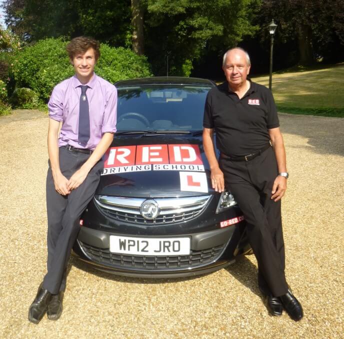 Tiff Needell and son with RED driving school car