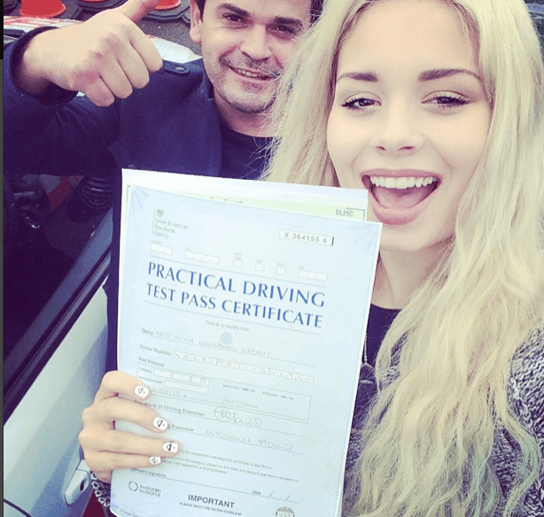 Nina Nesbitt holding practical driving test pass certificate